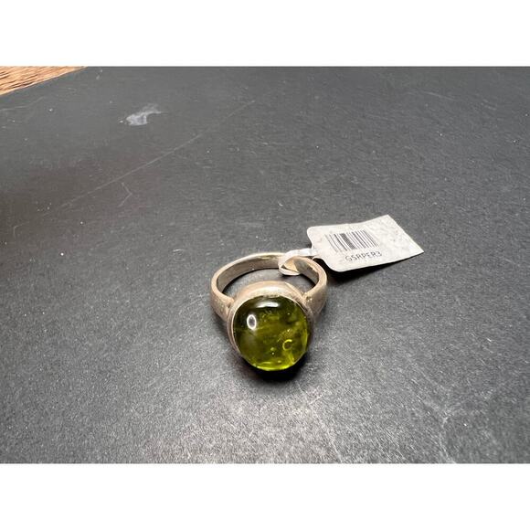SOLD 

NEW size 7 oval peridot sterling silver ring 6.20 grams - Picture 13 of 15